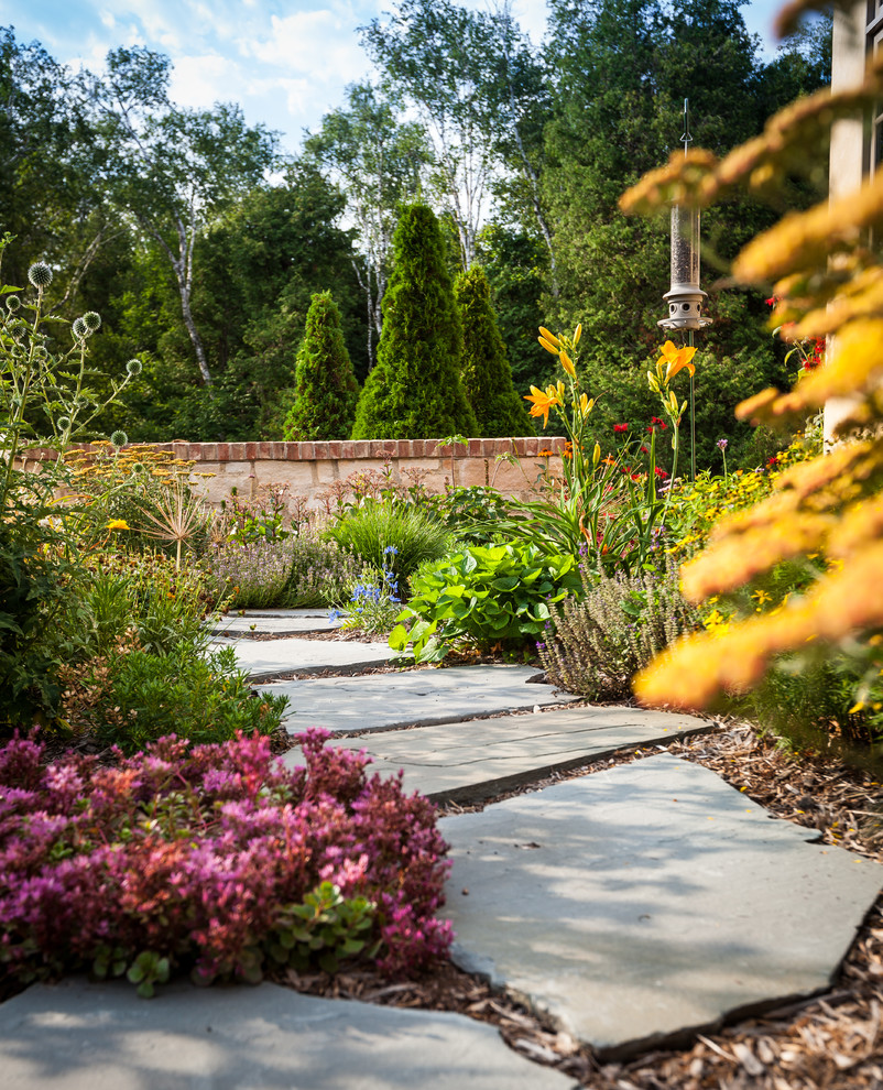 Photo of a large rustic full sun front yard landscaping.