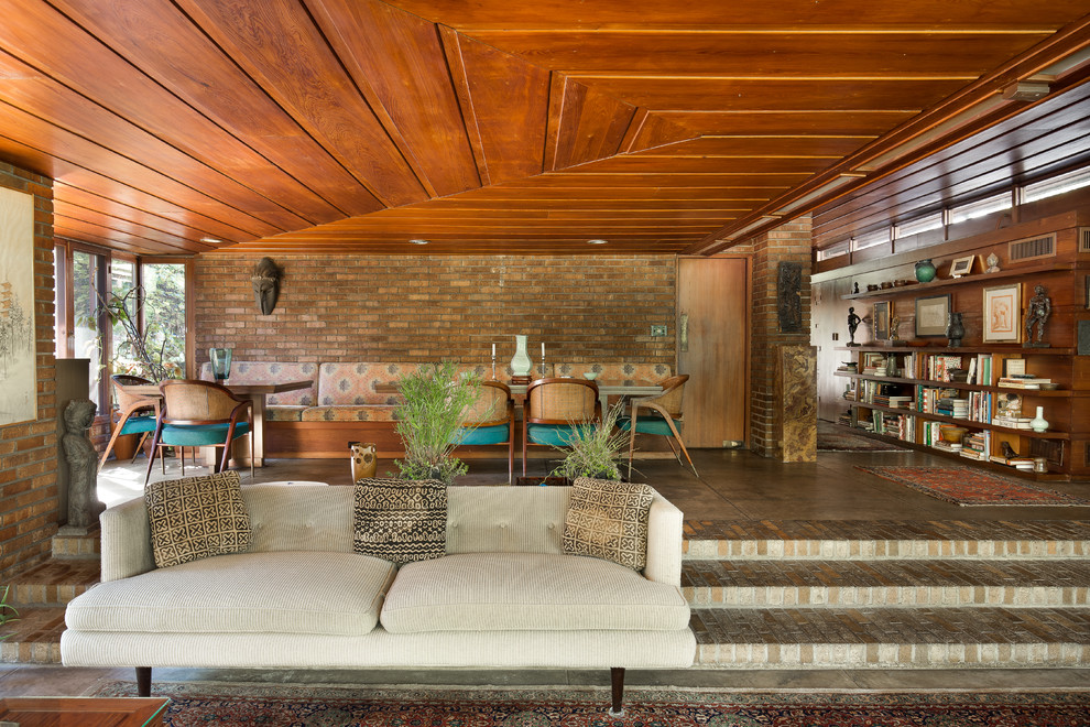 Photo of a midcentury open concept living room in Kansas City.