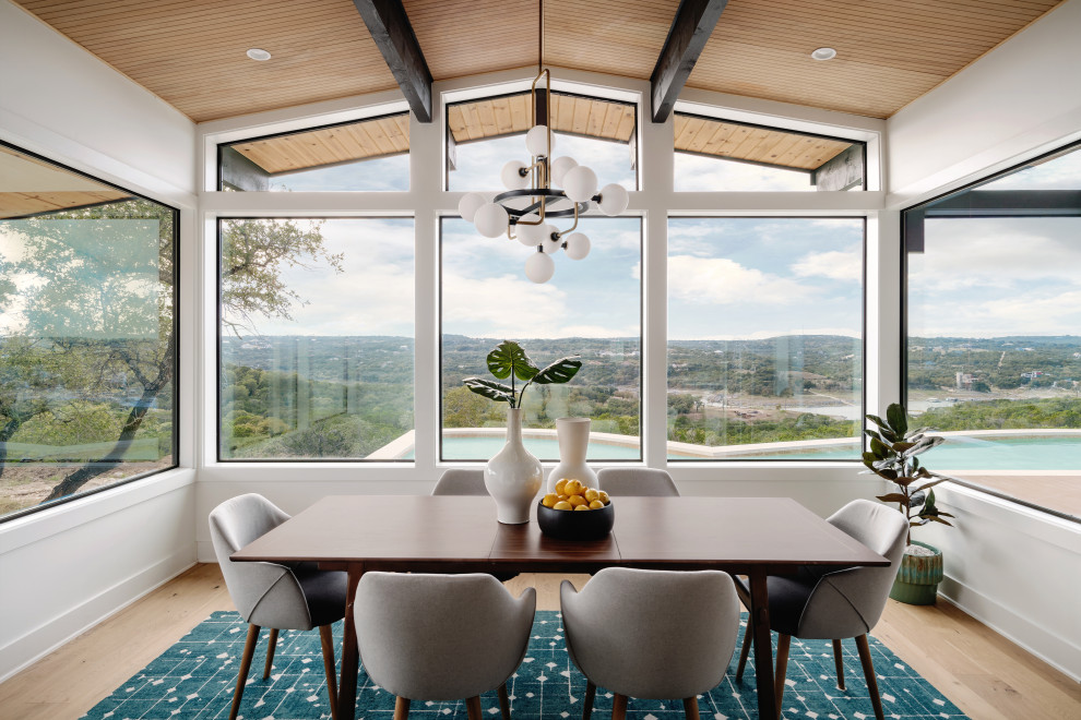 Inspiration for a mid-sized 1950s medium tone wood floor, beige floor and wood ceiling kitchen/dining room combo remodel in San Francisco with white walls