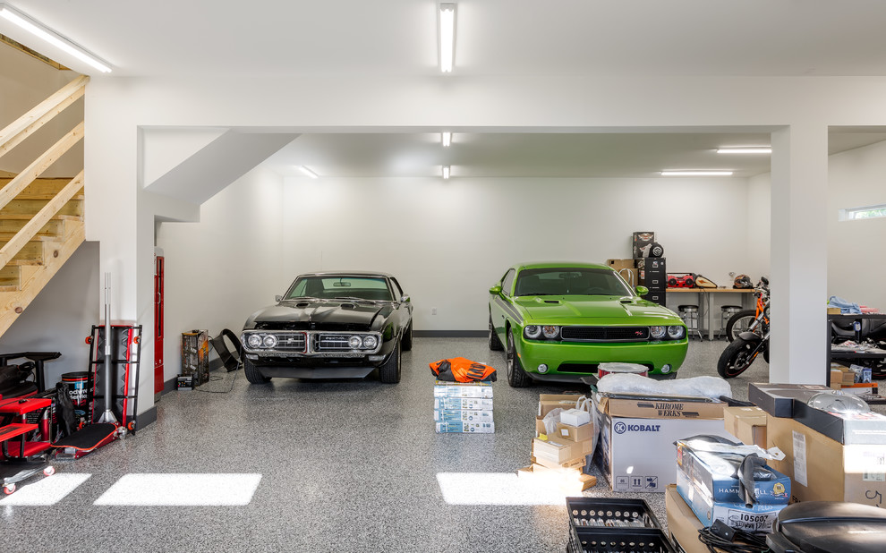 Inspiration for a huge transitional detached three-car home design remodel