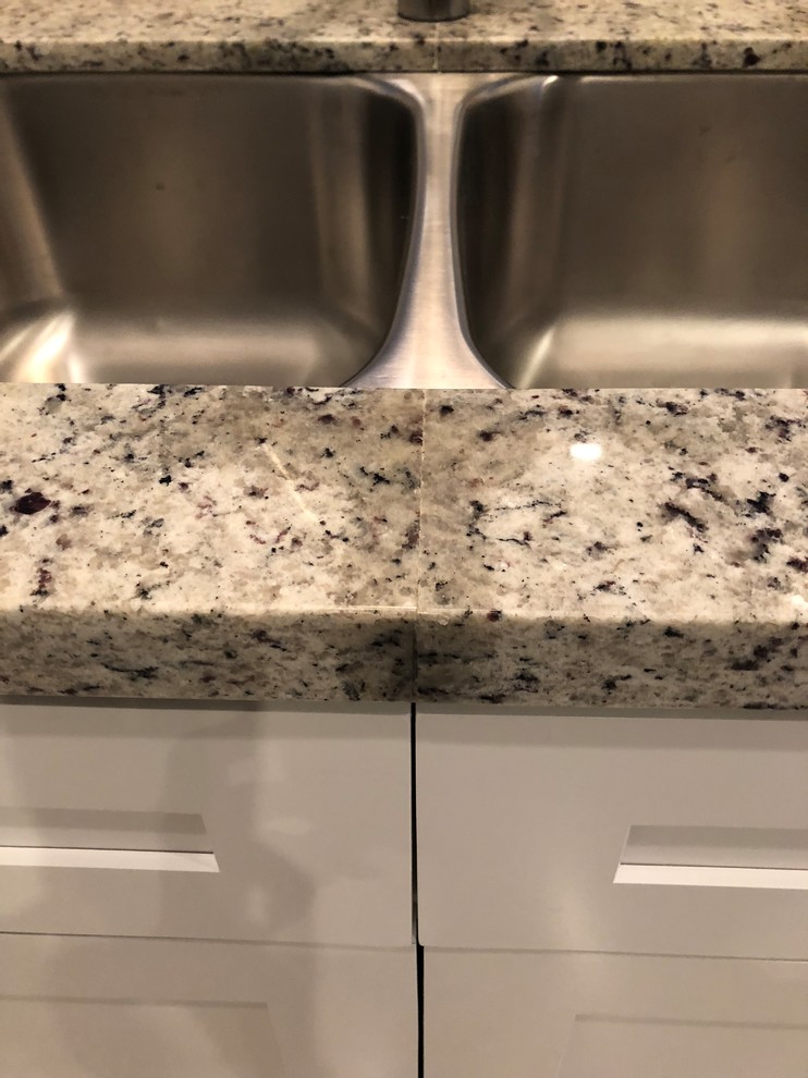 Stained Area at New Granite Seam Need Advice