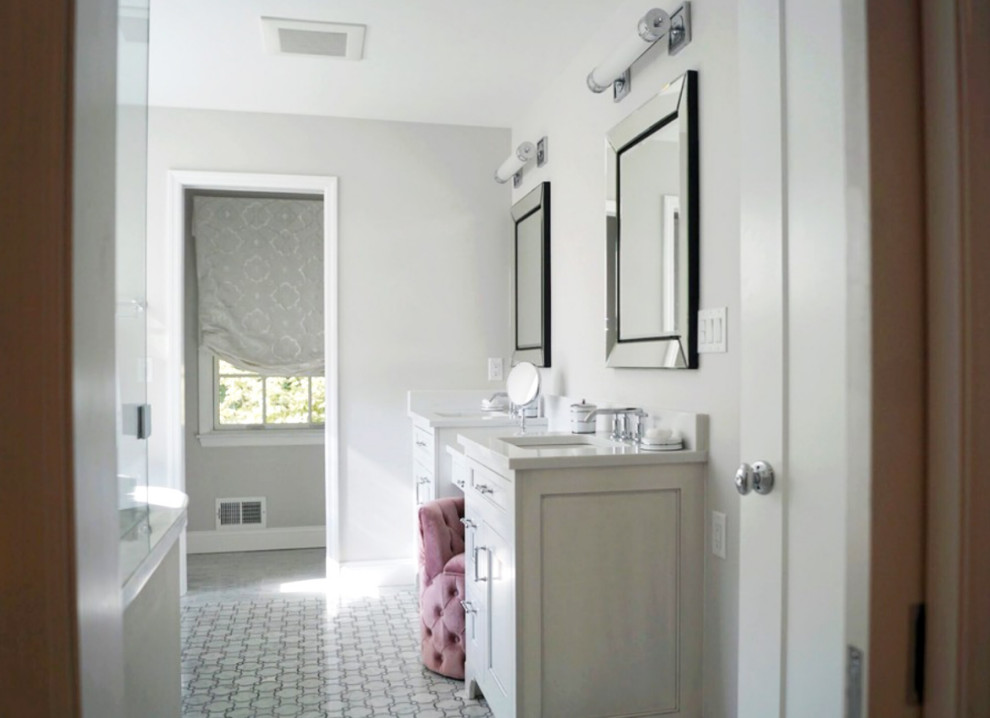 Freestanding bathtub - mid-sized transitional master white tile and ceramic tile gray floor and ceramic tile freestanding bathtub idea with a hinged shower door, white countertops, recessed-panel cabinets, white cabinets, gray walls, an undermount sink and solid surface countertops
