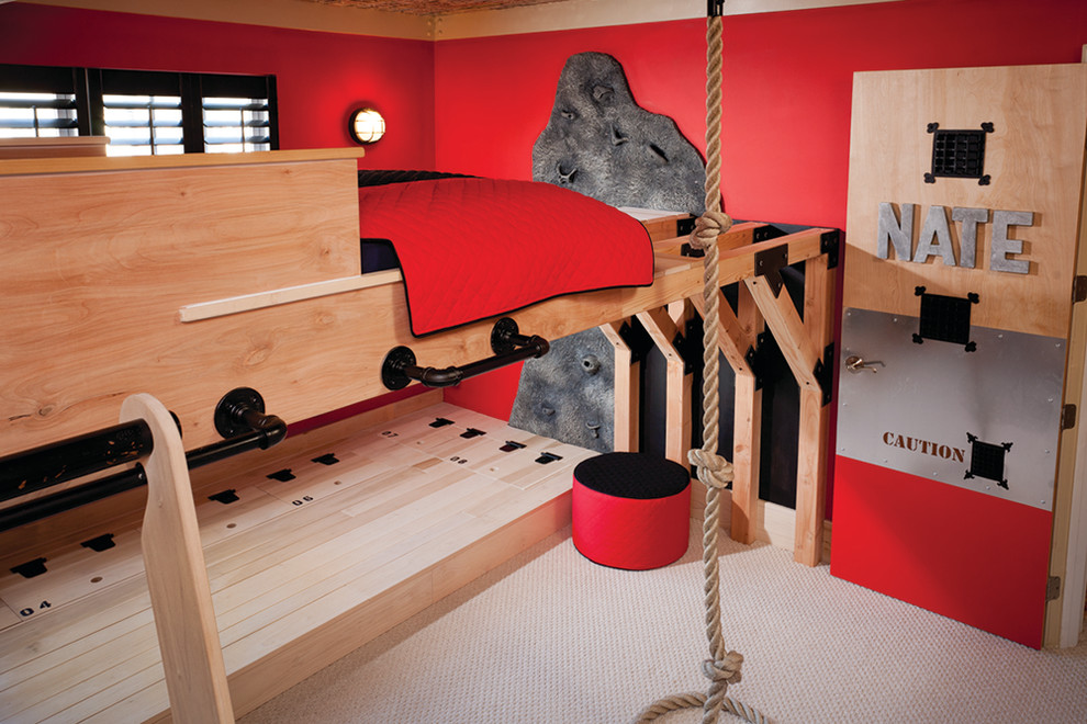 Design ideas for a small eclectic kids' room for boys in DC Metro with red walls and medium hardwood floors.