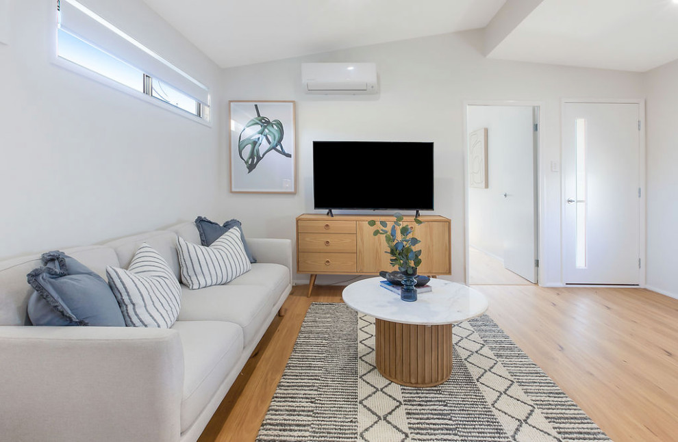Design ideas for a modern family room in Canberra - Queanbeyan.