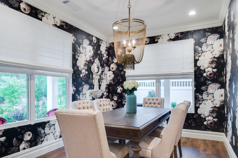 Inspiration for a mid-sized transitional separate dining room in Orange County with black walls and medium hardwood floors.