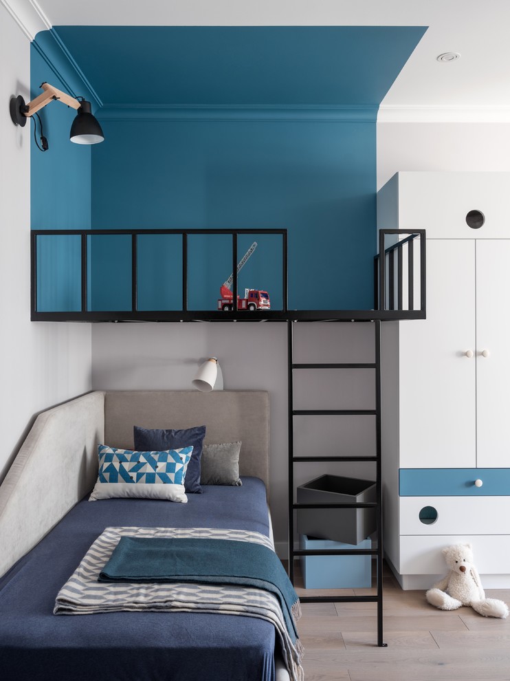 Design ideas for a mid-sized contemporary gender-neutral kids' bedroom for kids 4-10 years old in Moscow with grey walls, medium hardwood floors and beige floor.