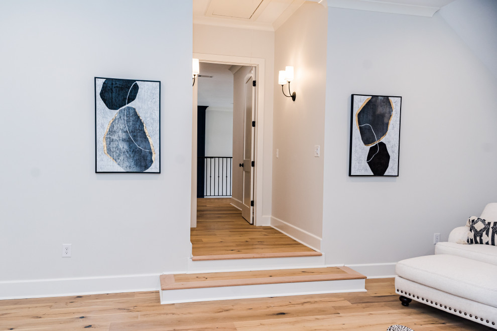 Example of a transitional home design design in Jackson