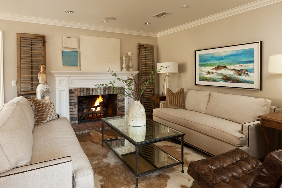 Photo of a traditional formal enclosed living room in Orange County with beige walls, a brick fireplace surround and no tv.