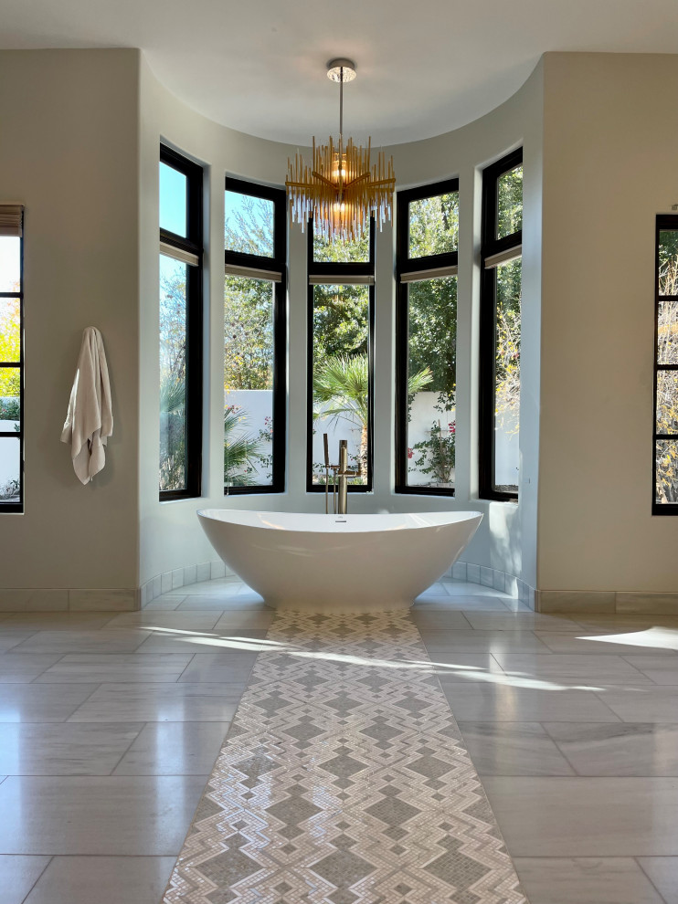 Design ideas for a large contemporary master wet room bathroom in Phoenix with flat-panel cabinets, white cabinets, a freestanding tub, gray tile, marble, grey walls, marble floors, an undermount sink, marble benchtops, grey floor, a hinged shower door, grey benchtops, a shower seat, a single vanity and a floating vanity.