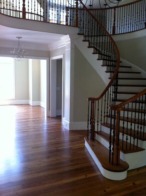 Custom Stained Reclaimed Heart Pine Flooring & Staircase