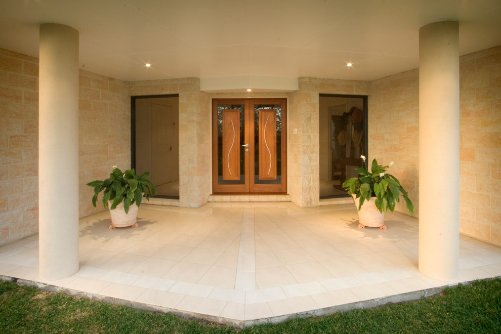 Expansive modern front door in Brisbane with beige walls, marble floors, a double front door and a medium wood front door.