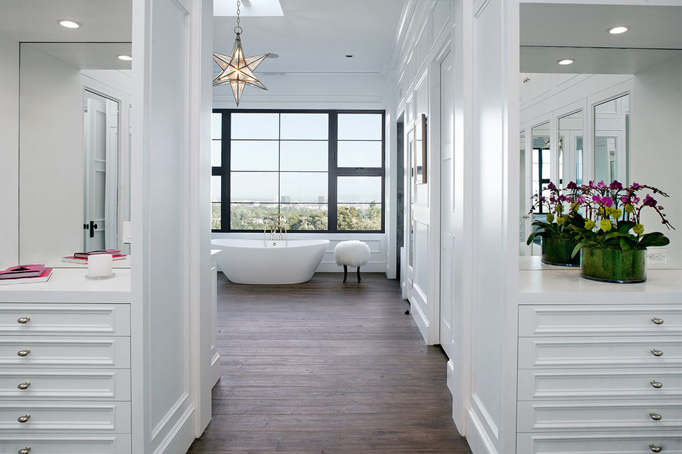 Inspiration for a large transitional master dark wood floor freestanding bathtub remodel with beaded inset cabinets, white cabinets, white walls and quartz countertops