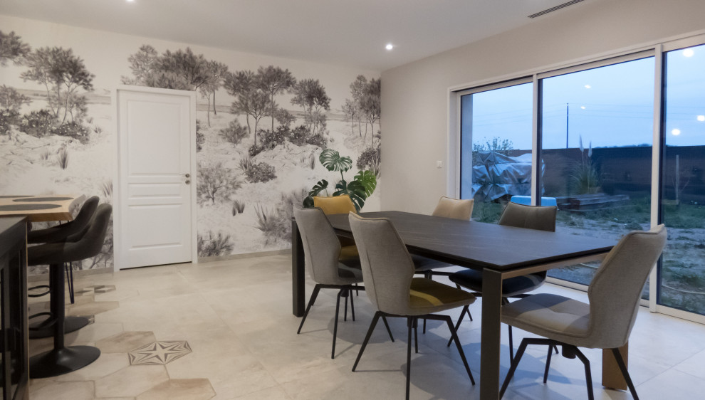 This is an example of a large modern dining room in Other with green walls, ceramic flooring, beige floors and wallpapered walls.