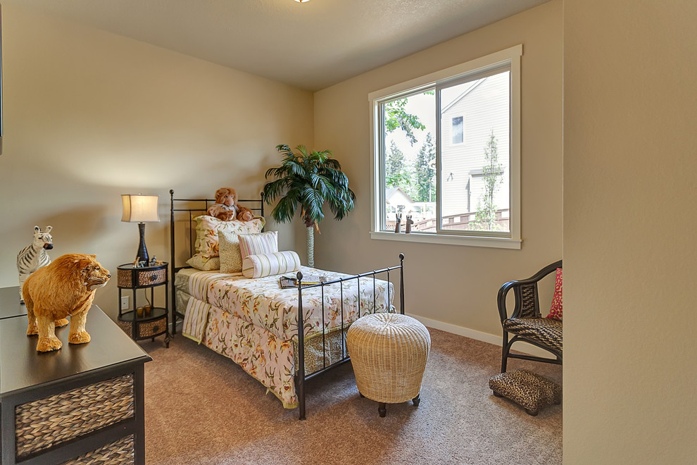 This is an example of a mid-sized transitional master bedroom in Portland with beige walls, carpet and no fireplace.
