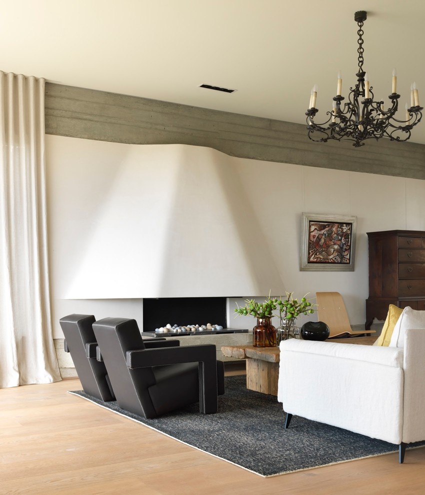 Photo of a large contemporary living room in Sydney with white walls, medium hardwood floors and a ribbon fireplace.