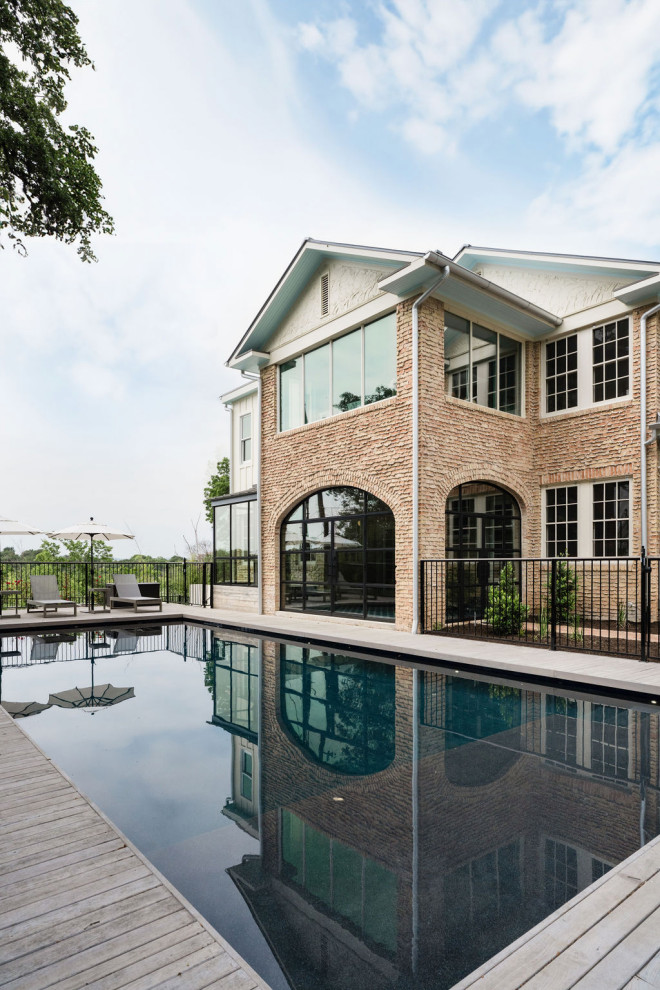 Inspiration for a transitional pool remodel in Austin