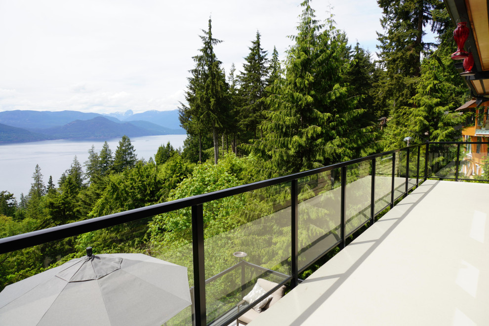 Photo of a small glass railing balcony in Vancouver.