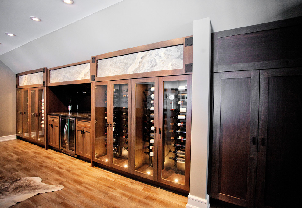This is an example of a transitional wine cellar in Toronto.