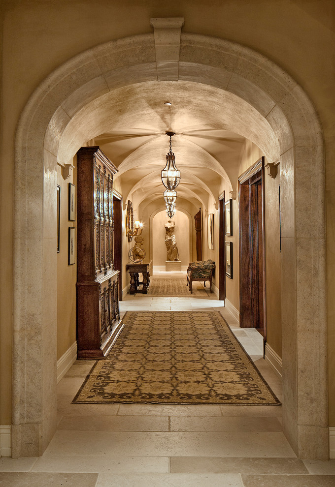 Photo of a traditional hallway in Los Angeles with beige walls.