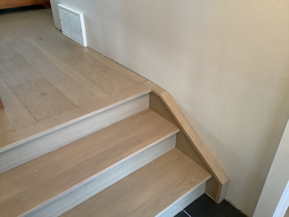 How should we transition the baseboards, and stairs here?