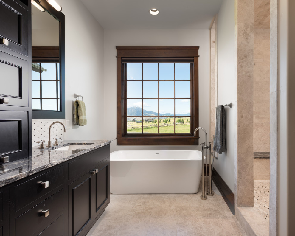 Inspiration for a country master bathroom in Other with recessed-panel cabinets, dark wood cabinets, a freestanding tub, an open shower, black and white tile, white walls, an undermount sink, granite benchtops, beige floor, an open shower, a double vanity and a built-in vanity.