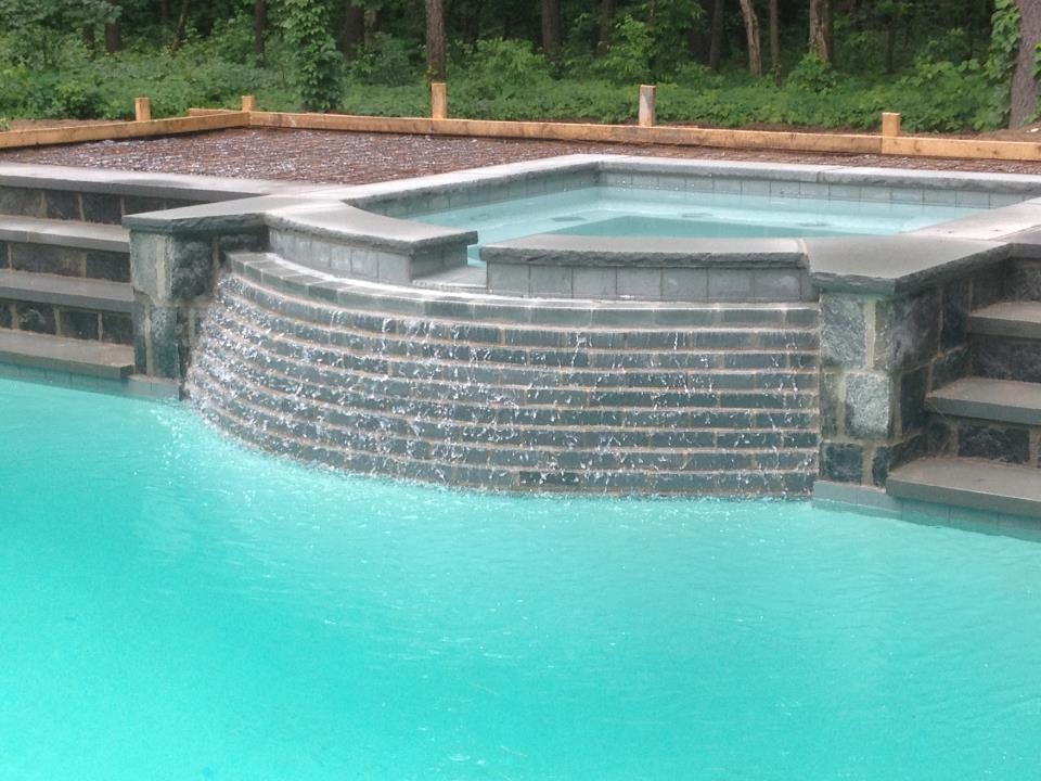 This is an example of a mediterranean pool in Boston.