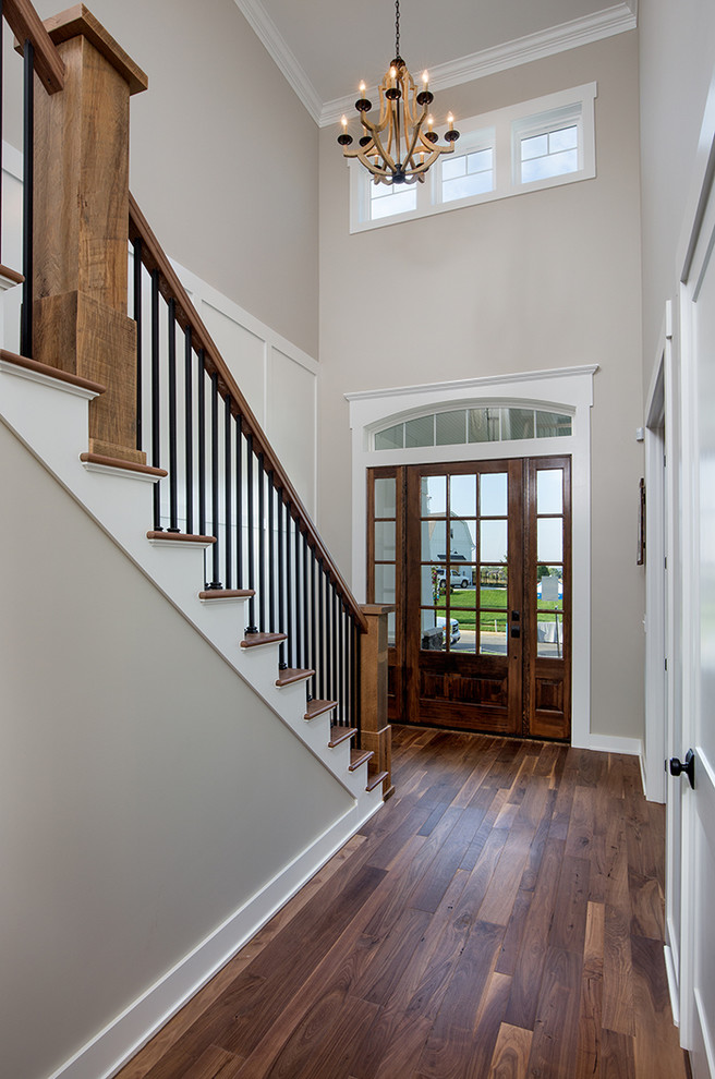 Large country wood straight staircase in Columbus.