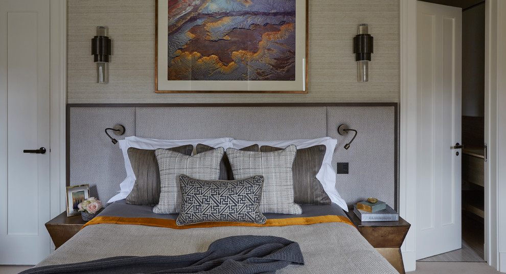 Inspiration for a transitional master bedroom in London.