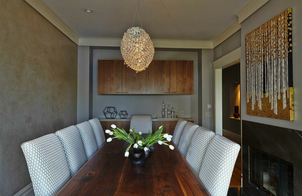 Large contemporary separate dining room in San Francisco with metallic walls and light hardwood floors.