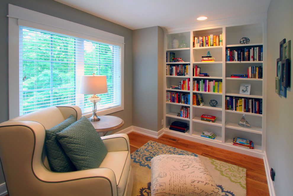 Design ideas for a large arts and crafts kids' study room in Grand Rapids with grey walls and light hardwood floors.