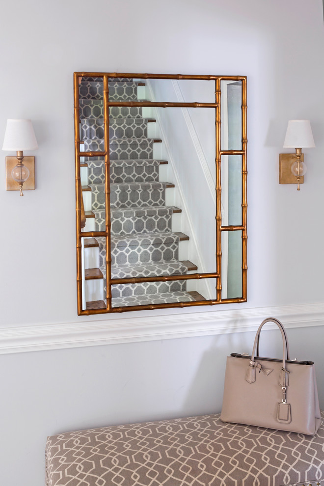 Mid-sized transitional dark wood floor and brown floor foyer photo in New York with beige walls