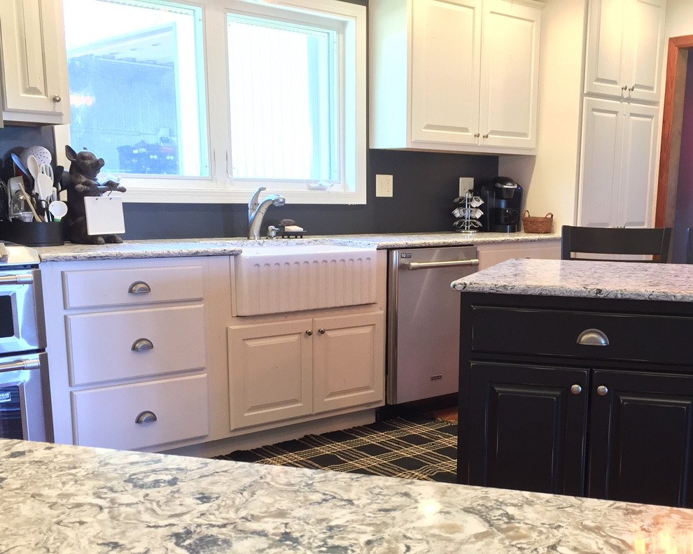 Inspiration for a large rustic l-shaped light wood floor open concept kitchen remodel in Chicago with a farmhouse sink, raised-panel cabinets, white cabinets, quartz countertops, stainless steel appliances and an island
