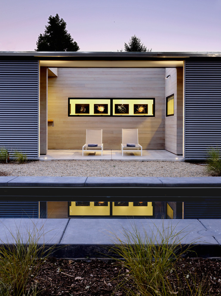 Small modern one-storey grey exterior in San Francisco with metal siding and a flat roof.