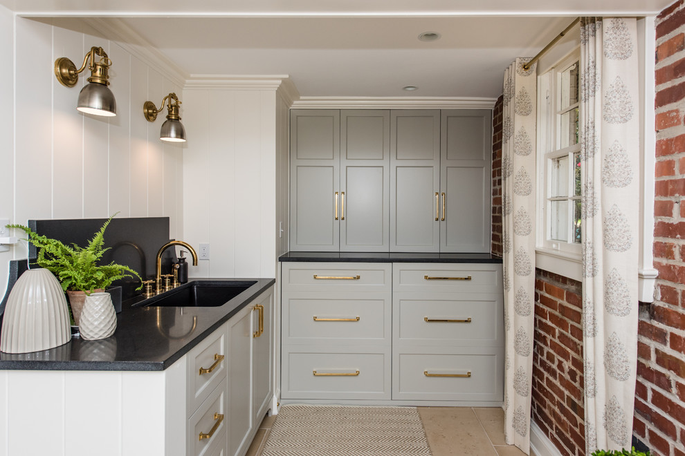 Mid-sized transitional underground ceramic tile basement photo in DC Metro with white walls