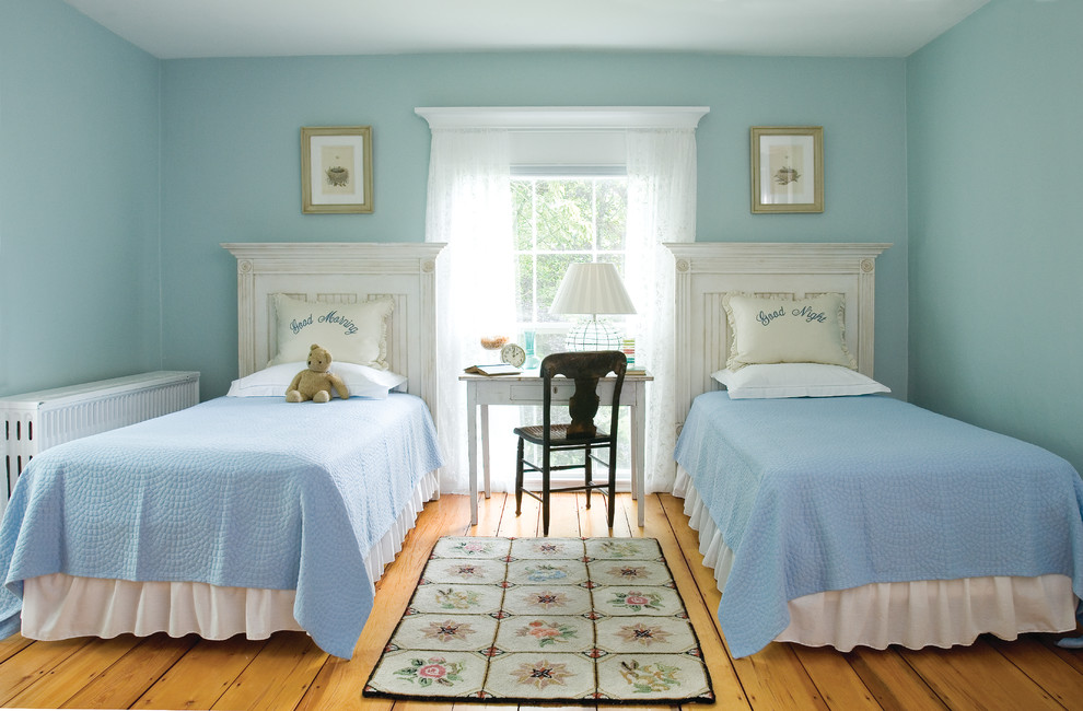 Traditional kids' room in Portland Maine with blue walls.