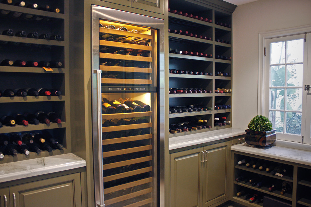 Photo of a mid-sized traditional wine cellar in Los Angeles with storage racks.