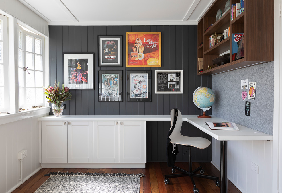 This is an example of a transitional study room in Brisbane with a built-in desk.