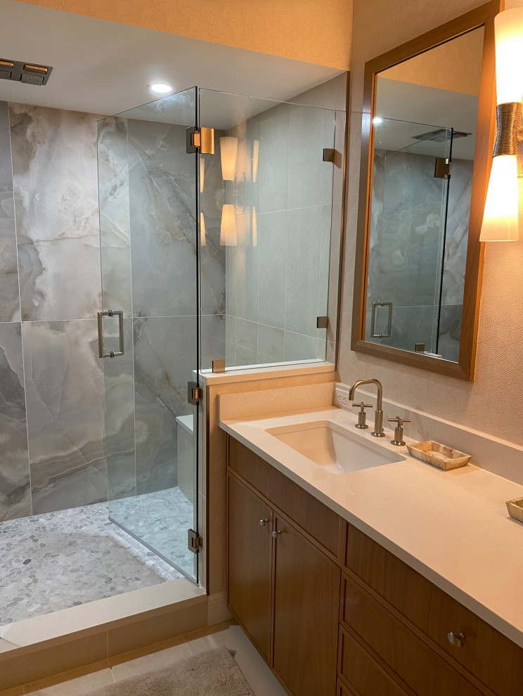 Example of a transitional home design design in Miami
