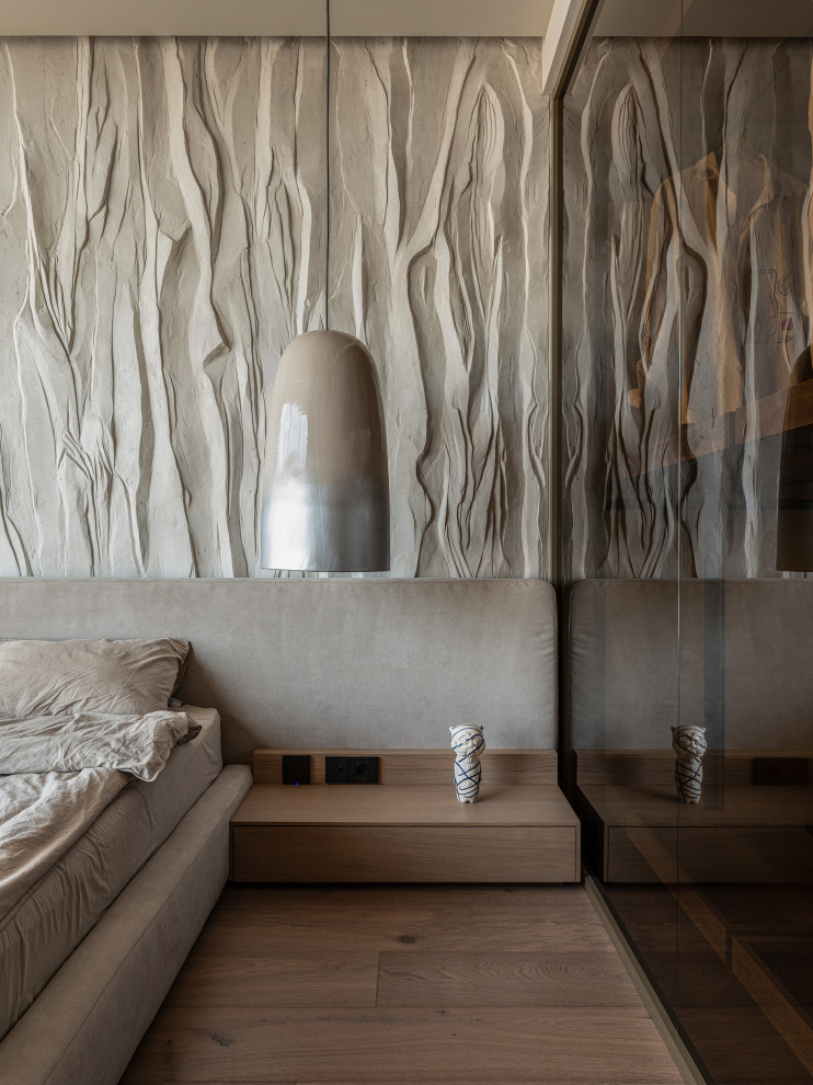 Свежая идея для дизайна: спальня в стиле модернизм с бежевыми стенами - отличное фото интерьера