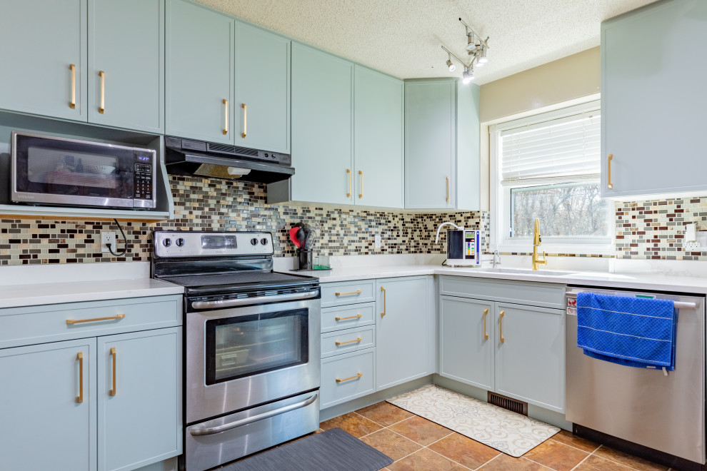 Example of a beach style home design design in Calgary