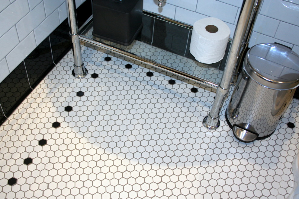 Photo of a small traditional master bathroom in San Francisco with a pedestal sink, a claw-foot tub, a shower/bathtub combo, a two-piece toilet, white tile, ceramic tile, white walls and mosaic tile floors.