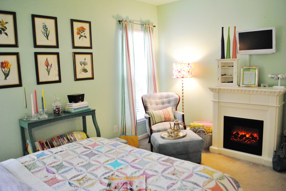 Design ideas for an eclectic bedroom in Charlotte with a standard fireplace.