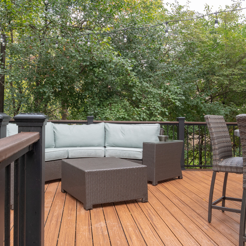 Mid-sized transitional backyard deck photo with no cover