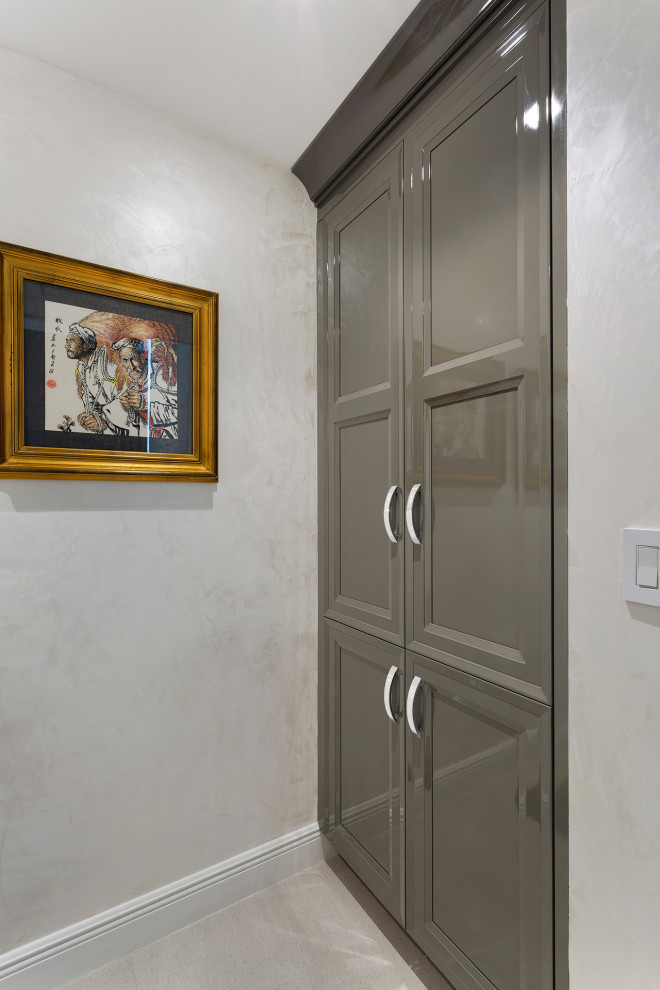 Bathroom - mid-sized transitional master porcelain tile and gray floor bathroom idea in Miami with recessed-panel cabinets, gray cabinets, a one-piece toilet and beige walls