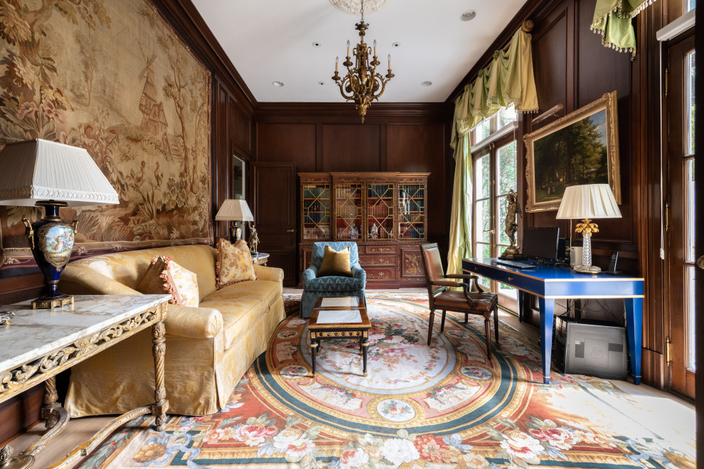 Inspiration for a large traditional study room in Atlanta with brown walls, a freestanding desk and panelled walls.
