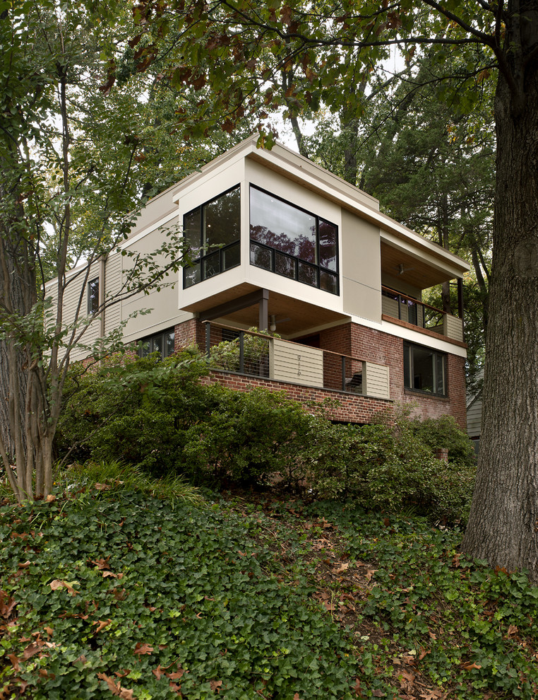 Photo of a midcentury two-storey exterior in DC Metro.