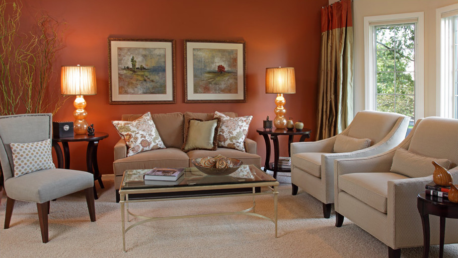 Inspiration for a mid-sized transitional formal open concept living room in Minneapolis with orange walls.