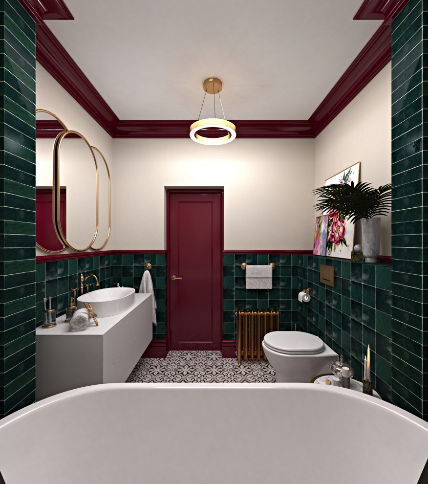Inredning av ett klassiskt mellanstort vit vitt badrum, med vita skåp, ett fristående badkar, grön kakel, keramikplattor, beige väggar, klinkergolv i keramik, ett nedsänkt handfat och bänkskiva i akrylsten
