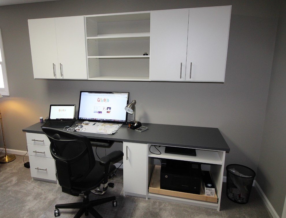 Study room - mid-sized transitional built-in desk study room idea in Indianapolis