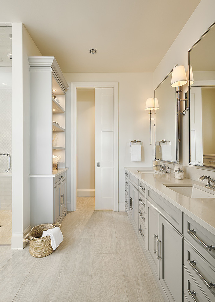 Large beach style master bathroom in Vancouver with shaker cabinets, beige cabinets, beige walls, porcelain floors, an undermount sink, quartzite benchtops, beige floor, beige benchtops and a shower curtain.